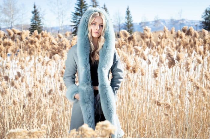 Hooded Toscana Shearling 35” on woman in a field