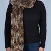 waist length brown scarf on woman