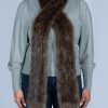 long brown crossed scarf on woman