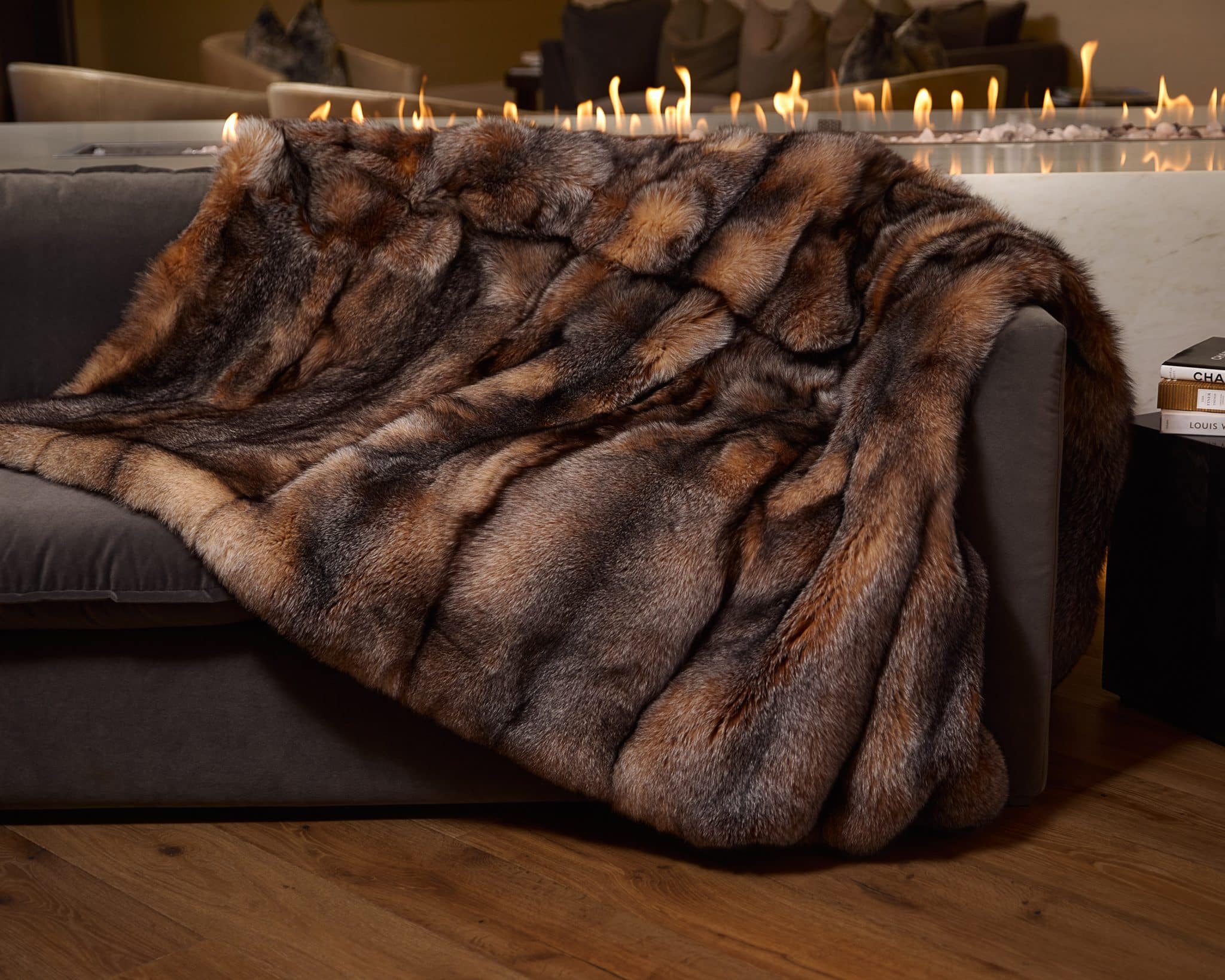 Crystal Fox Blanket draped over couch