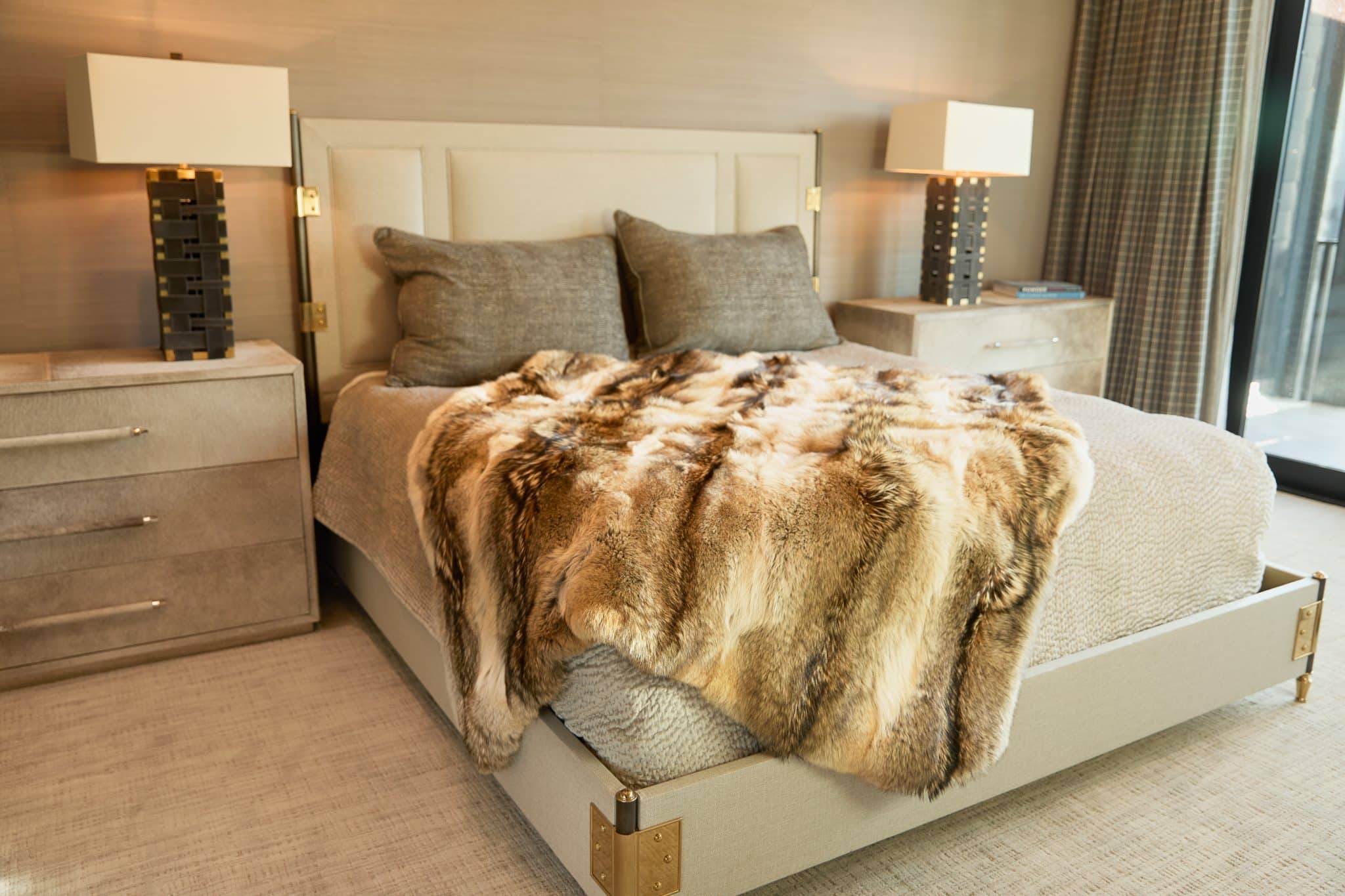 SFG BLANKETS 20243357 Coyote Blanket draped over bed