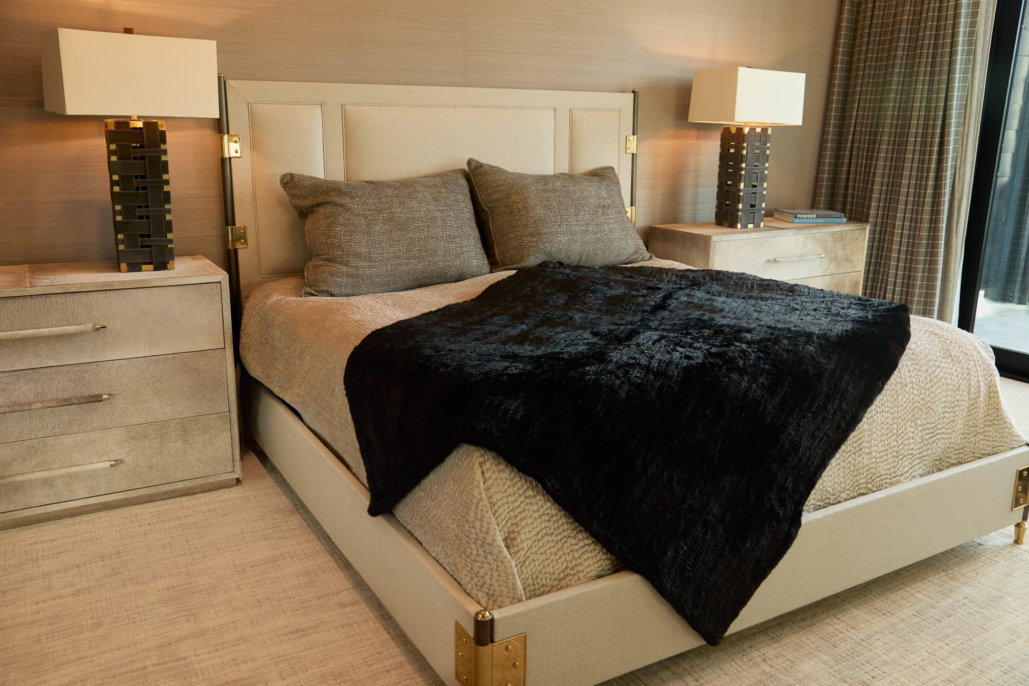 Knitted Chinchilla Rex Blanket - Black - Draped over bed
