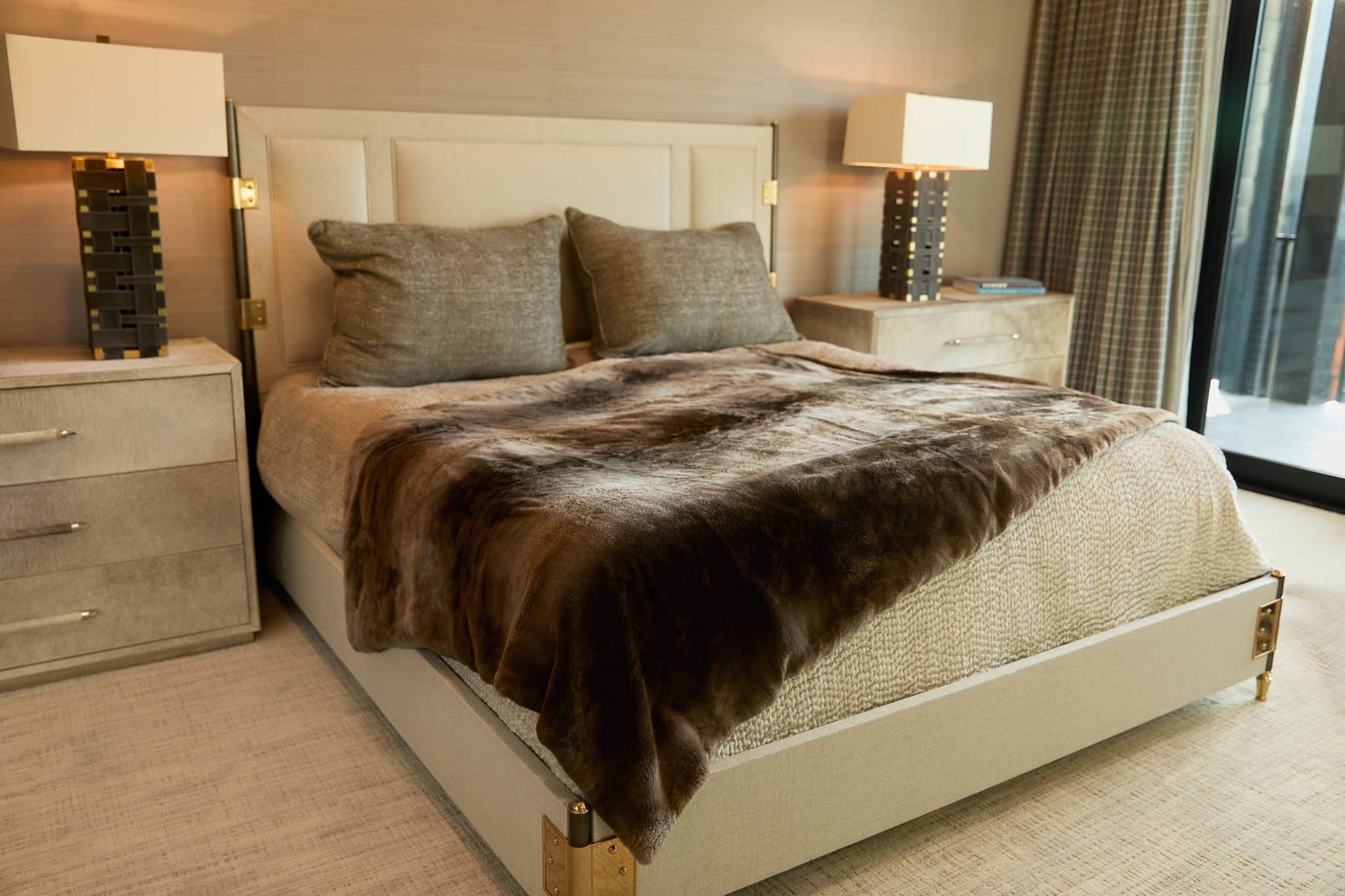 SFG BLANKETS 20243443 Phantom Beaver Blanket draped over bed