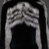 CAMILLA SILVER FOX JACKET BACK the back of a woman in a silver and black jacket against a grey background