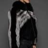 CAMILLA SILVER FOX JACKET SIDE the side woman in a silver and black jacket against a grey background