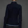 IMANI NAVY BLUE JACKET BACK the back of a woman in a dark blue jacket against a grey background
