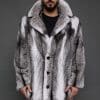 MENS HENRY CROSS MINK FRONT man in a black and white coat against a grey background