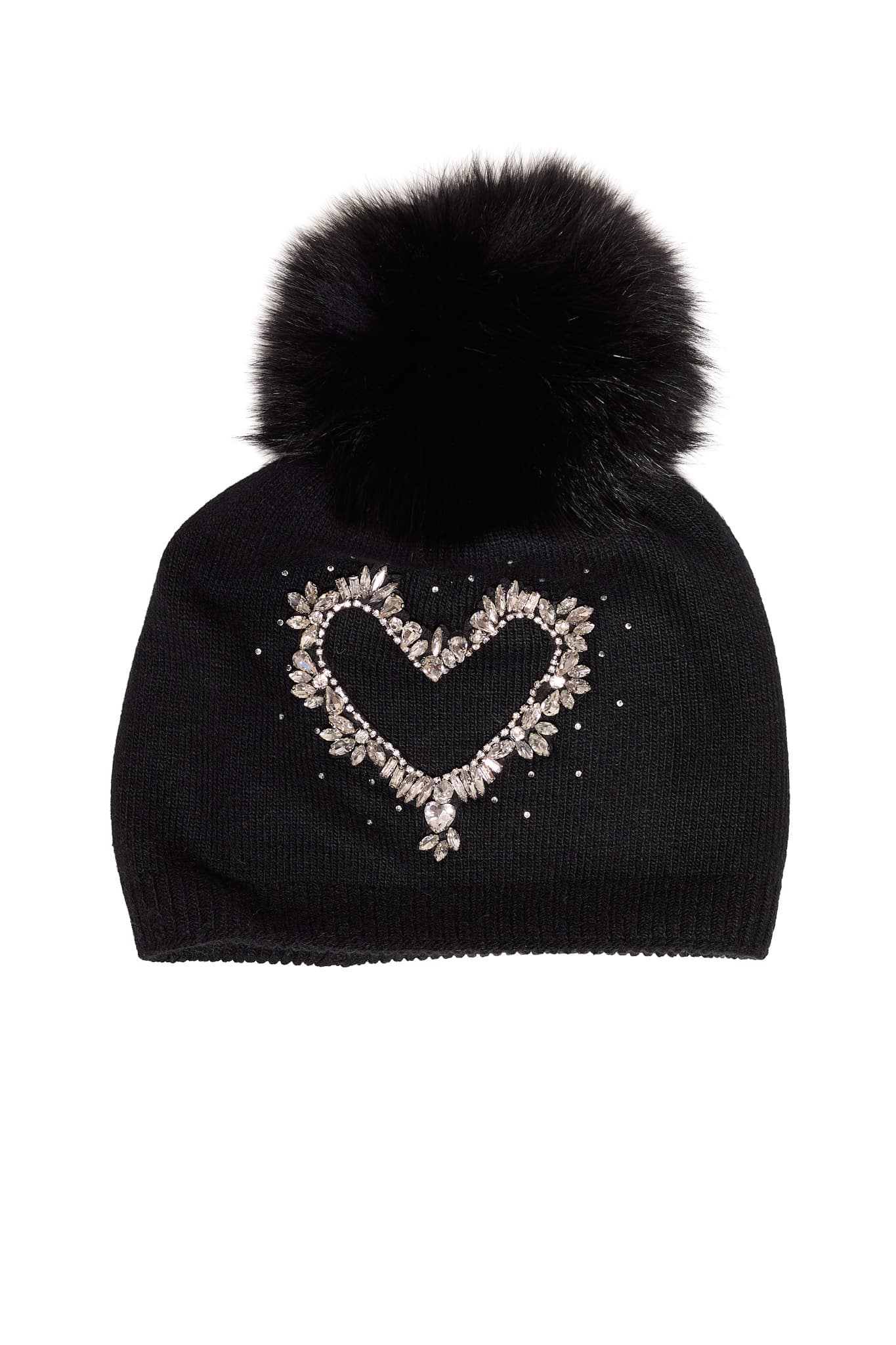 A black beanie with a heart graphic on it and a fox pom pom on top laying on a white background.
