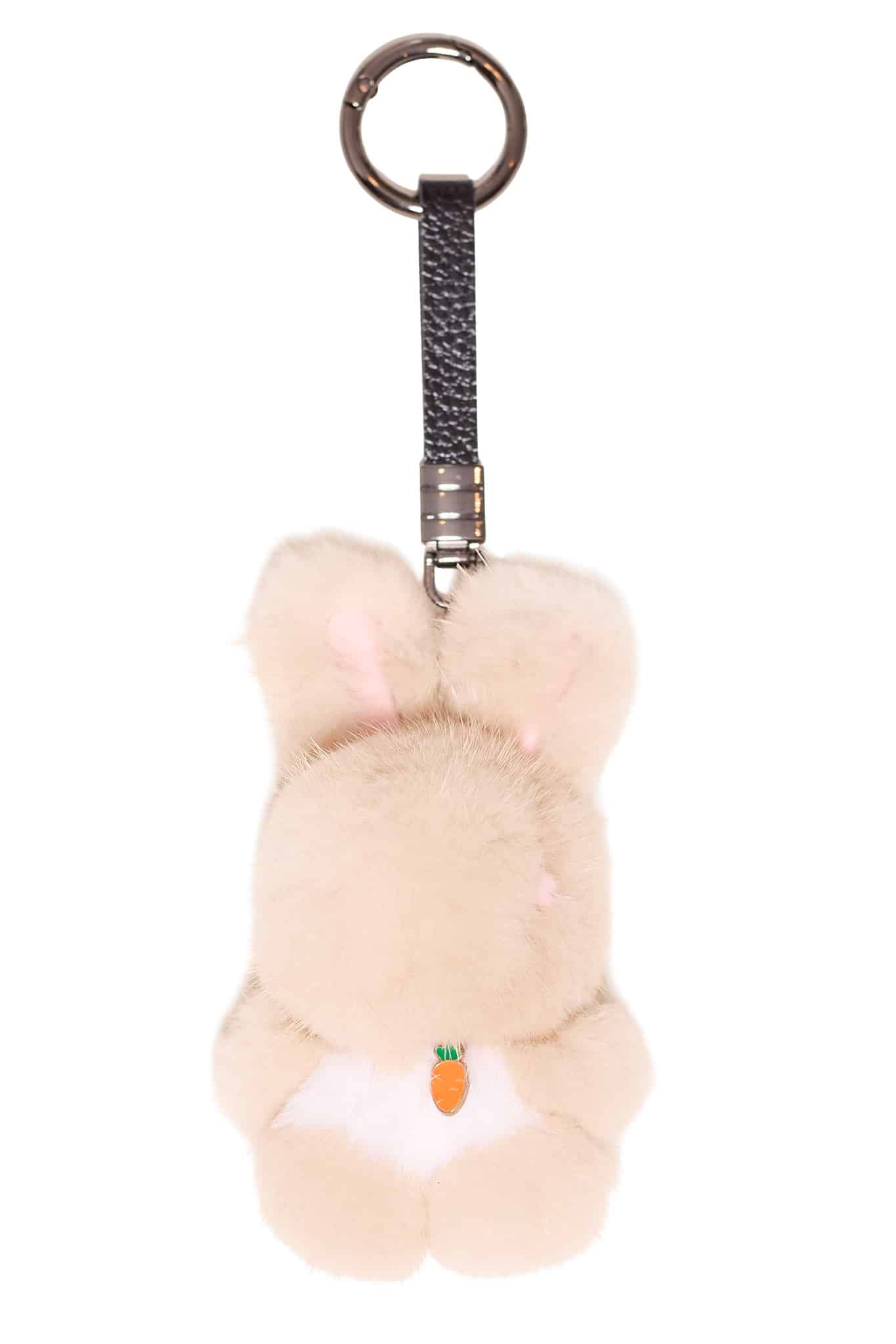 Mink Bunny Keychain Carrot Beige Beige colored mink bunny keychain with a carrot on its chest arranged atop a white background.