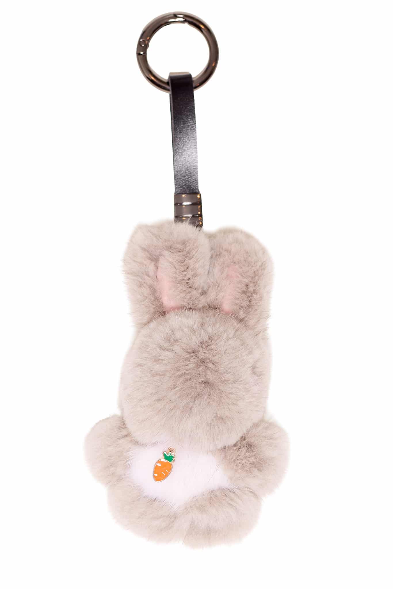 Brown colored mink bunny keychain with a carrot on its chest arranged atop a white background.