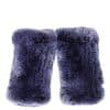 Two blue snow colored knit chinchilla rex fingerless gloves arranged atop a white background.