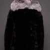 GIA MINK BLACK SILVER FOX BACK the back of a woman in a black and grey fur jacket against a grey background