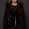 GIA MINK ESPRESSO SILVER FOX FRONT the front of a woman in a brown fur jacket against a grey background