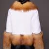 MARLEY MINK JACKET RED FOX BACK the back of a woman in a red and white fur jacket against a grey backdrop