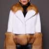 MARLEY MINK JACKET RED FOX FRONT the front of a woman in a red and white fur jacket against a grey backdrop