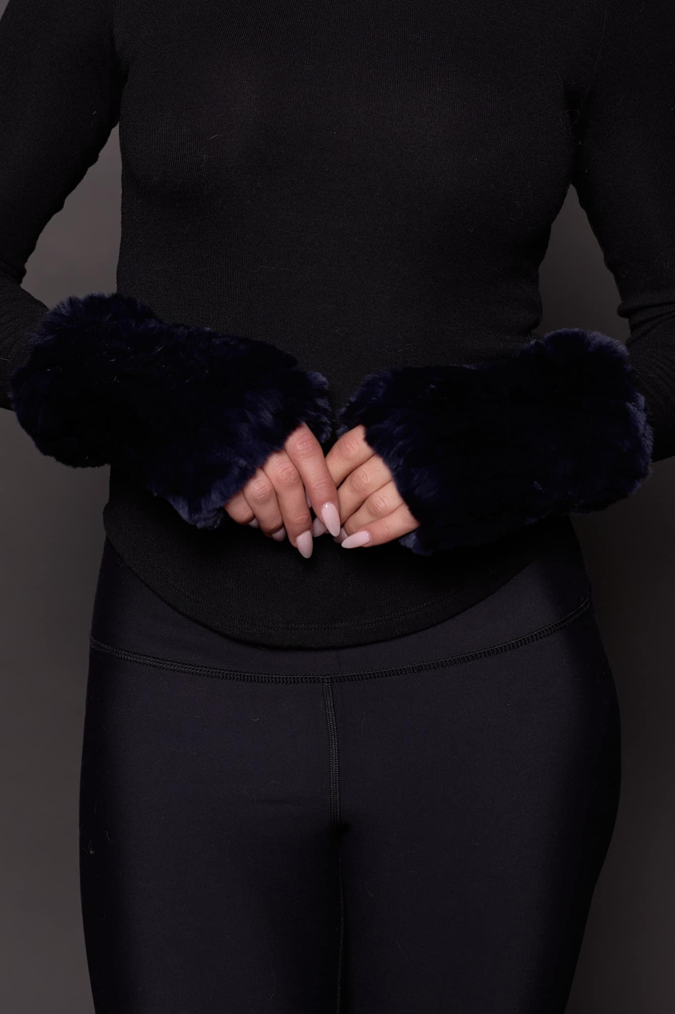 REX RABBIT KNIT GLOVES BLUE Image of a hands wearing black knitted fur fingerless gloves