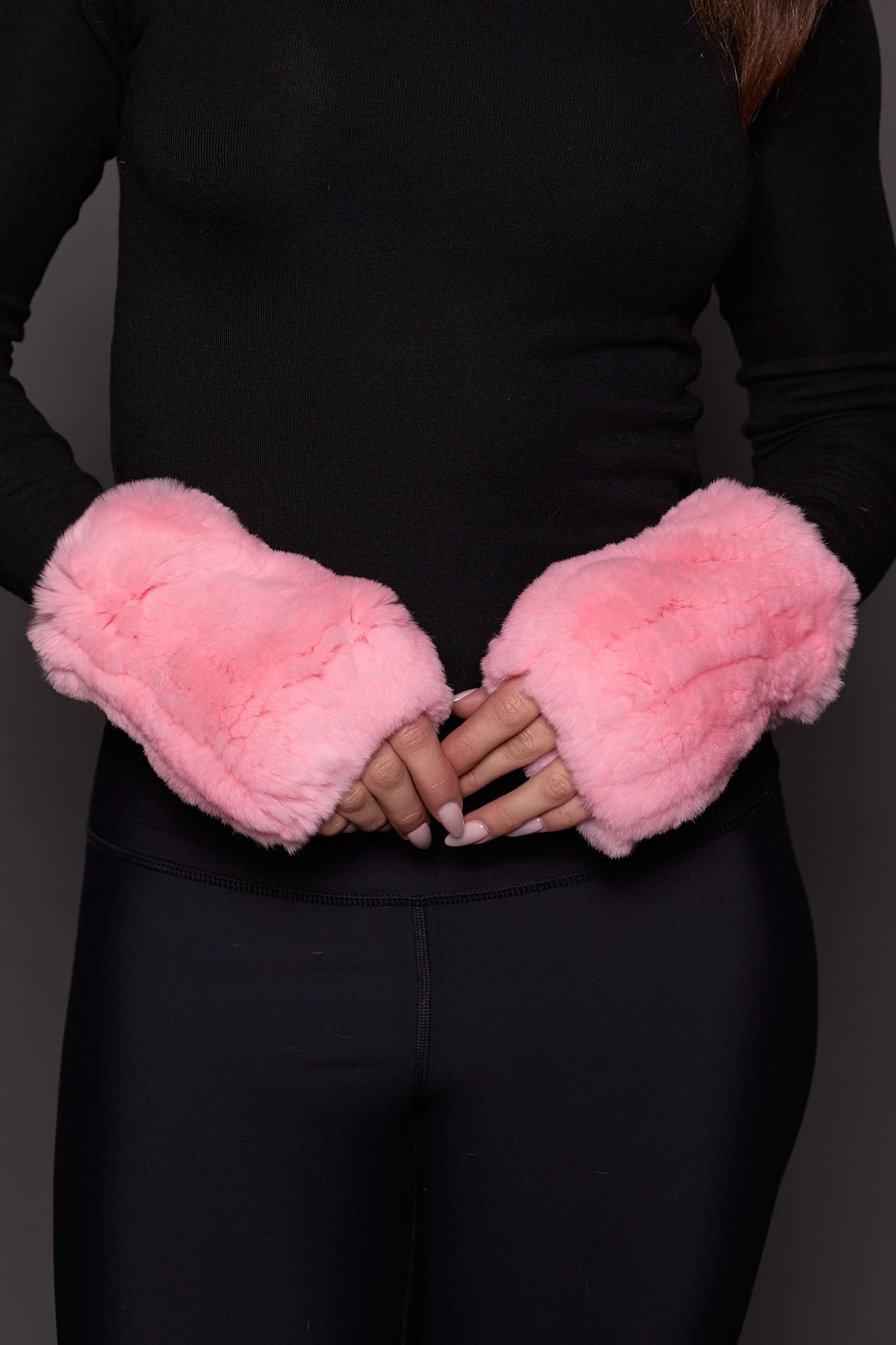 REX RABBIT KNIT GLOVES PINK Image of a hands wearing pink knitted fur fingerless gloves